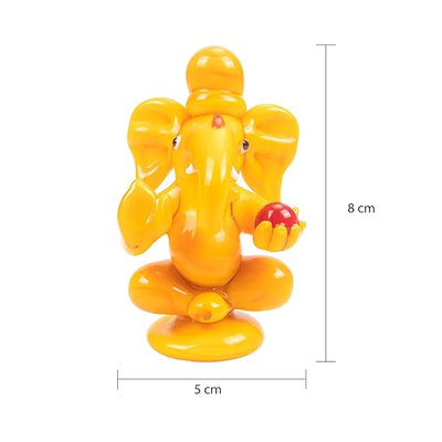 Handmade glass Ganesha statue, 8x5 cm, ideal for car dashboard or home altar. Symbolizes wisdom, success, and divine blessings.