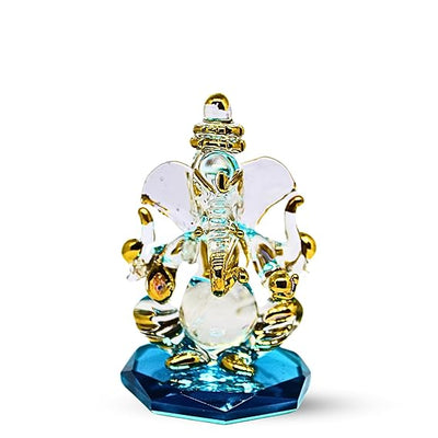 Handcrafted glass Ganesha statue, 8x5x5 cm, ideal for home altar or car dashboard. Symbolizes wisdom, prosperity, and good fortune