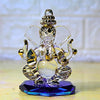 Handcrafted glass Ganesha statue, 8x5 cm, ideal for car dashboard or home altar. Symbolizes wisdom, prosperity, and divine blessings.