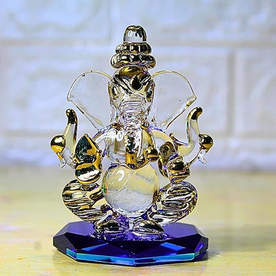 Handcrafted glass Ganesha statue, 8x5 cm, ideal for car dashboard or home altar. Symbolizes wisdom, prosperity, and divine blessings.