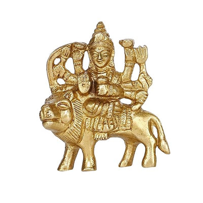 Handmade brass statue of Goddess Durga, intricately crafted and polished, ideal for home altars or car dashboards, symbolizing strength and protection.