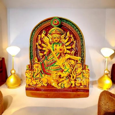 Earthenware idol of Goddess Durga, intricately handcrafted by artisans, ideal for home decor, altars, or gifting.