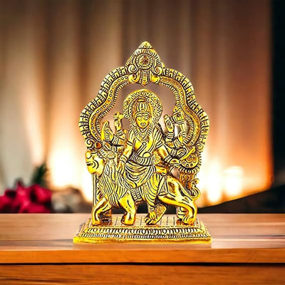 Metal Durga Murti with golden finish, intricately crafted, symbolizing divine protection and grace, ideal for home or temple decor.