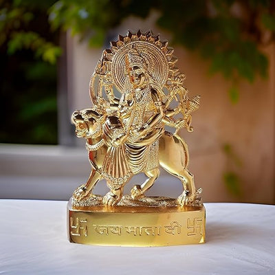 Handcrafted metal statue of Goddess Durga Mata, showcasing intricate detailing and a golden finish, ideal for pooja rooms and spiritual decor
