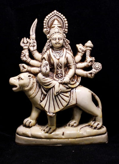 Handmade Goddess Maa Durga Devi Idol crafted from resin in a reddish-white color, ideal for home decor and spiritual practices