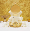 Handcrafted Gold-Crowned Ganesha idol made of gold-plated ceramic, symbolizing prosperity and success, ideal for home decor and altars.