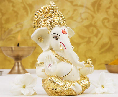 Handcrafted Gold-Crowned Ganesha idol made of gold-plated ceramic, symbolizing prosperity and success, ideal for home decor and altars.