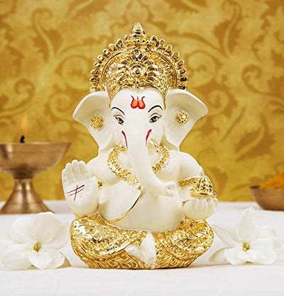 Handcrafted Gold-Crowned Ganesha idol made of gold-plated ceramic, symbolizing prosperity and success, ideal for home decor and altars.