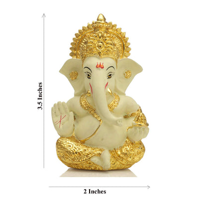 Handcrafted gold-plated Ganesha idol made of ceramic, symbolizing protection and good fortune, ideal for car interiors and altars.