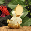 Handcrafted gold-plated Ganesha idol made of ceramic, symbolizing protection and good fortune, ideal for car interiors and altars.