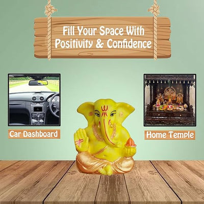Gold-plated Lord Ganesha idol made of resin, symbolizing prosperity and success. Ideal for home, office, or car decor, showcasing intricate details."