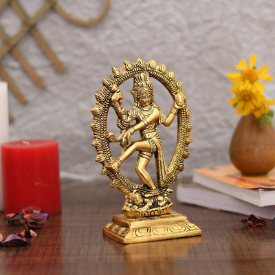 Gold-plated Nataraja statue, intricately crafted metal idol of Lord Shiva, showcasing divine energy and grace, ideal for home decor and altars.