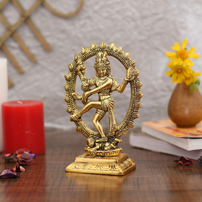 Gold-plated Nataraja statue, intricately crafted metal idol of Lord Shiva, showcasing divine energy and grace, ideal for home decor and altars.