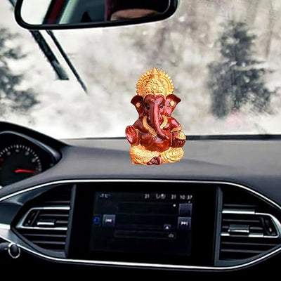 Handmade gold-plated Lord Ganesha idol, 5x5x5 cm, crafted from resin. Perfect for altars, home decor, car dashboards, or gifting."