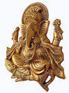 Handcrafted golden Ganesh idol wall hanging, made of metal, symbolizing prosperity and wisdom, 26 cm x 21 cm x 3 cm, perfect for home decor and altars.