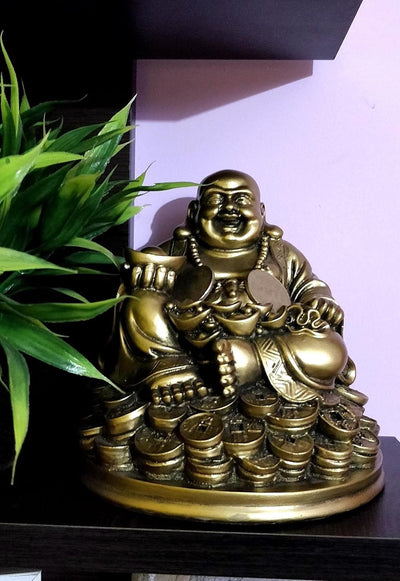 Exquisite golden Laughing Buddha figurine symbolizing wealth and happiness, ideal for home or office decor
