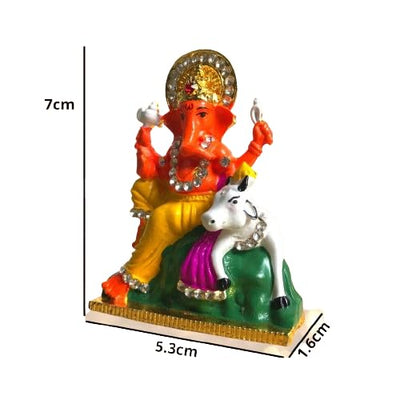 Handcrafted brass Ganesha idol, 200 grams, measuring 5.3x1.6x7 cm, perfect for car dashboard, symbolizing wisdom, prosperity, and protection."