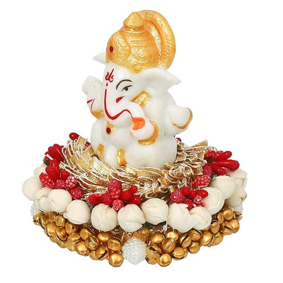 Handcrafted Ganesha idol in premium resin, weighing 240 grams, measuring 8x8x8 cm, accompanied by a plate, ideal for home altar or car décor, symbolizing wisdom and prosperity."