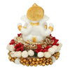 Handcrafted Ganesha idol in premium resin, weighing 240 grams, measuring 8x8x8 cm, accompanied by a plate, ideal for home altar or car décor, symbolizing wisdom and prosperity."