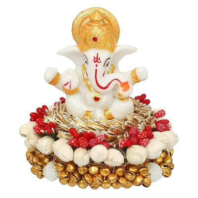 Handcrafted Ganesha idol in premium resin, weighing 240 grams, measuring 8x8x8 cm, accompanied by a plate, ideal for home altar or car décor, symbolizing wisdom and prosperity."