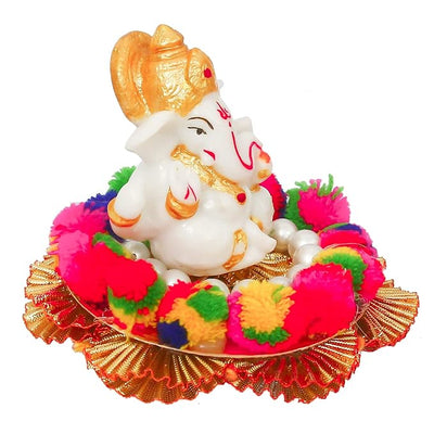 Handmade Ganesha idol crafted from premium resin, weighing 400 grams, measuring 10.2x10.2x8.6 cm, accompanied by a plate, perfect for home altar or car décor, symbolizing wisdom and prosperity."