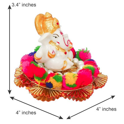 Handmade Ganesha idol crafted from premium resin, weighing 400 grams, measuring 10.2x10.2x8.6 cm, accompanied by a plate, perfect for home altar or car décor, symbolizing wisdom and prosperity."