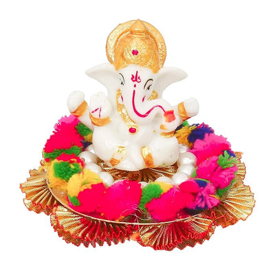Handmade Ganesha idol crafted from premium resin, weighing 400 grams, measuring 10.2x10.2x8.6 cm, accompanied by a plate, perfect for home altar or car décor, symbolizing wisdom and prosperity."