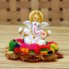 Handmade Ganesha idol crafted from premium resin, weighing 400 grams, measuring 10.2x10.2x8.6 cm, accompanied by a plate, perfect for home altar or car décor, symbolizing wisdom and prosperity."