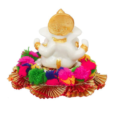 Handmade Ganesha idol crafted from premium resin, weighing 400 grams, measuring 10.2x10.2x8.6 cm, accompanied by a plate, perfect for home altar or car décor, symbolizing wisdom and prosperity."