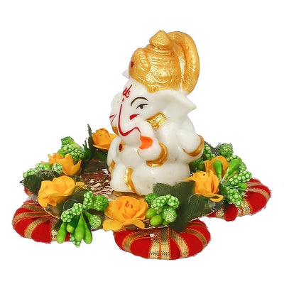 Handmade Ganesha idol crafted from premium resin, weighing 400 grams, measuring 11x11x7 cm, accompanied by a plate, ideal for home altar or car décor, symbolizing wisdom and prosperity."