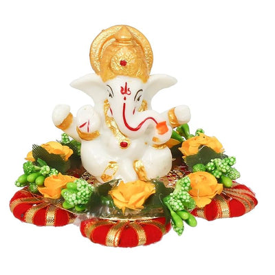 Handmade Ganesha idol crafted from premium resin, weighing 400 grams, measuring 11x11x7 cm, accompanied by a plate, ideal for home altar or car décor, symbolizing wisdom and prosperity."