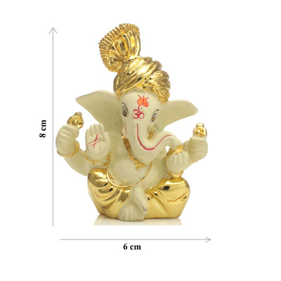 Handcrafted gold-plated Ganesha idol made from ceramic, symbolizing prosperity and positivity, perfect for home decor and altars.