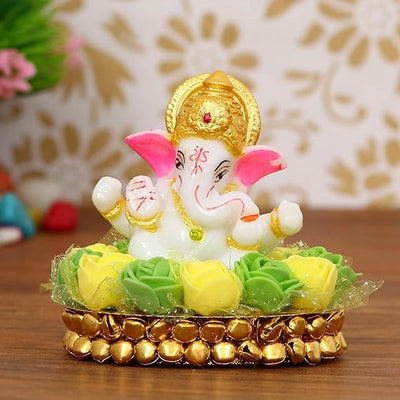 Handcrafted Lord Ganesha idol in resin, measuring 8 x 8 x 8 cm, weighing 200 grams, symbolizing wisdom and prosperity.