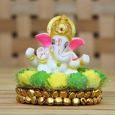 Handcrafted Lord Ganesha idol in resin, measuring 8 x 8 x 8 cm, weighing 200 grams, symbolizing wisdom and prosperity.