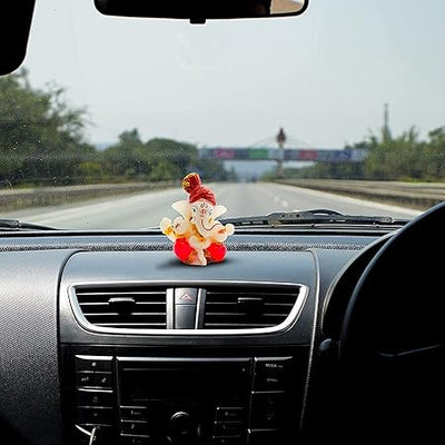 Handcrafted Lord Ganesha idol made of resin, ideal for home decor, car dashboards, and gifting. Symbol of wisdom and prosperity.
