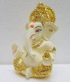 Handcrafted Ganesha idol in gold/silver plating, measuring 4L x 5W x 8.9H cm, symbolizing success and wisdom for your home or car.