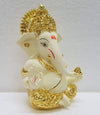 Handcrafted Ganesha idol in gold/silver plating, measuring 4L x 5W x 8.9H cm, symbolizing success and wisdom for your home or car.