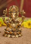 Handmade brass Ganesha idol, symbolizing prosperity and wisdom, perfect for home decor and altars."