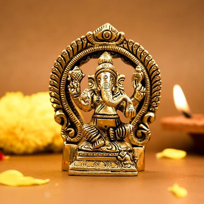 Handmade brass Ganesha idol, 375g, 6.6x3x8.7 cm, intricately crafted for home decor or altar, symbolizing wisdom and prosperity."