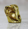 Handmade brass Ganesha idol, symbolizing wisdom and prosperity, perfect for home decor and altars.