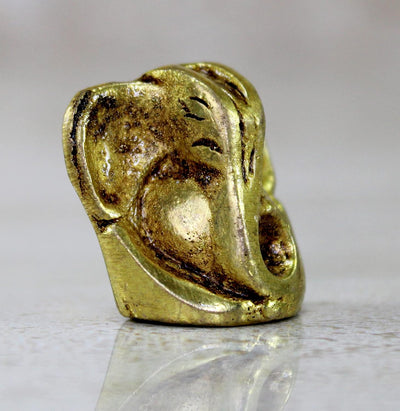 Handmade brass Ganesha idol, symbolizing wisdom and prosperity, perfect for home decor and altars.