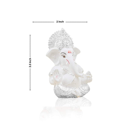 "Handmade ceramic Ganesha idol, intricately designed, ideal for dashboard decoration, symbolizing wisdom and protection.