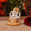 "Handmade ceramic Ganesha idol for car dashboard, measuring 5.1L x 5.1W x 6.4H cm, symbolizing blessings and protection during travel."