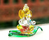 Handmade crystal glass Ganesha idol for car dashboard, showcasing intricate design and spiritual elegance
