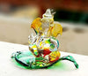Handmade crystal glass Ganesha idol for car dashboard, showcasing intricate design and spiritual elegance