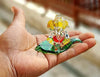 Handmade crystal glass Ganesha idol for car dashboard, showcasing intricate design and spiritual elegance