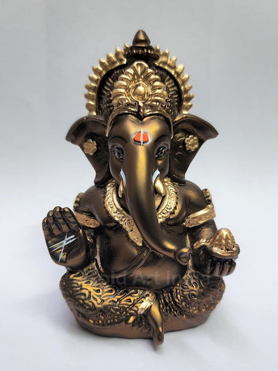Handmade French Brown Ganesha idol with golden accents, symbolizing prosperity and new beginnings, perfect for home or office decor.