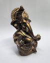 Handmade French Brown Ganesha idol with golden accents, symbolizing prosperity and new beginnings, perfect for home or office decor.