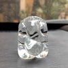 "Handmade Ganesha idol in glass, designed for car dashboards, featuring intricate details and a sleek finish for spiritual protection on the road."