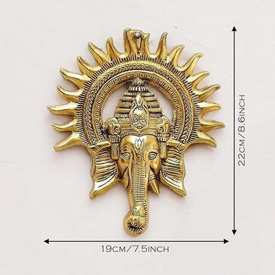 "Handmade Ganesha idol in metal, showcasing intricate craftsmanship and design, perfect for wall hanging or home altar decoration."